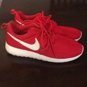 Red Nike Roshe.
